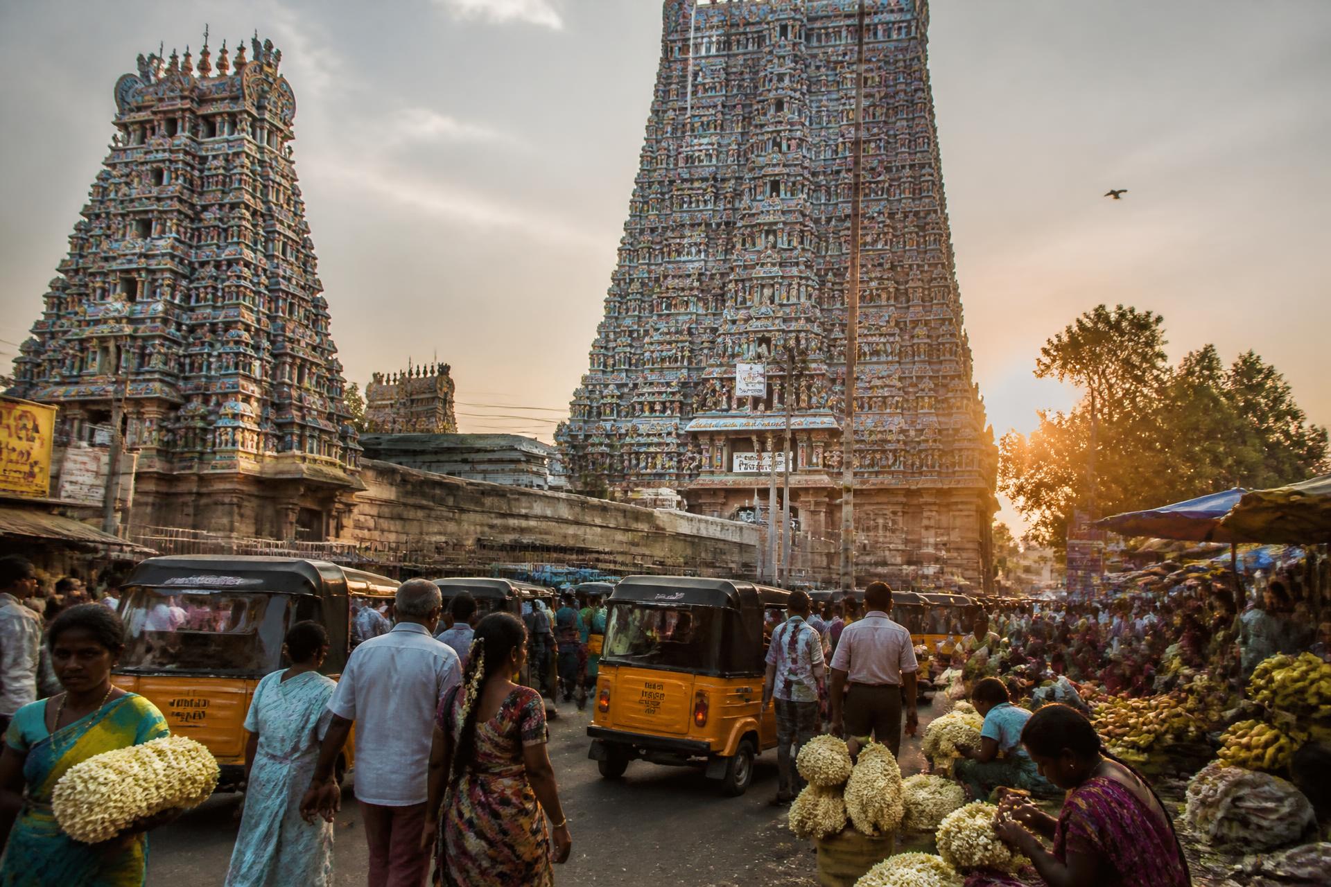 Meenakshi Amman Temple gopurams above the Madurai flower market
